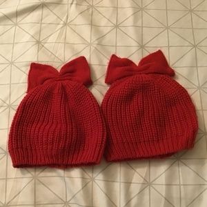 Two baby girls knitted hats
